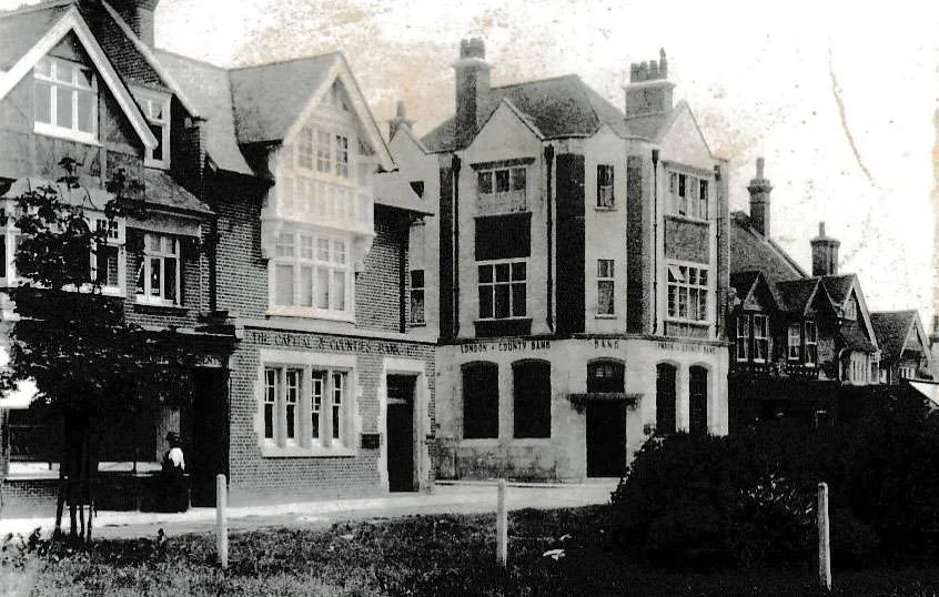 The pair of banks facing each other across Rowland Road, with their original names, around 1910