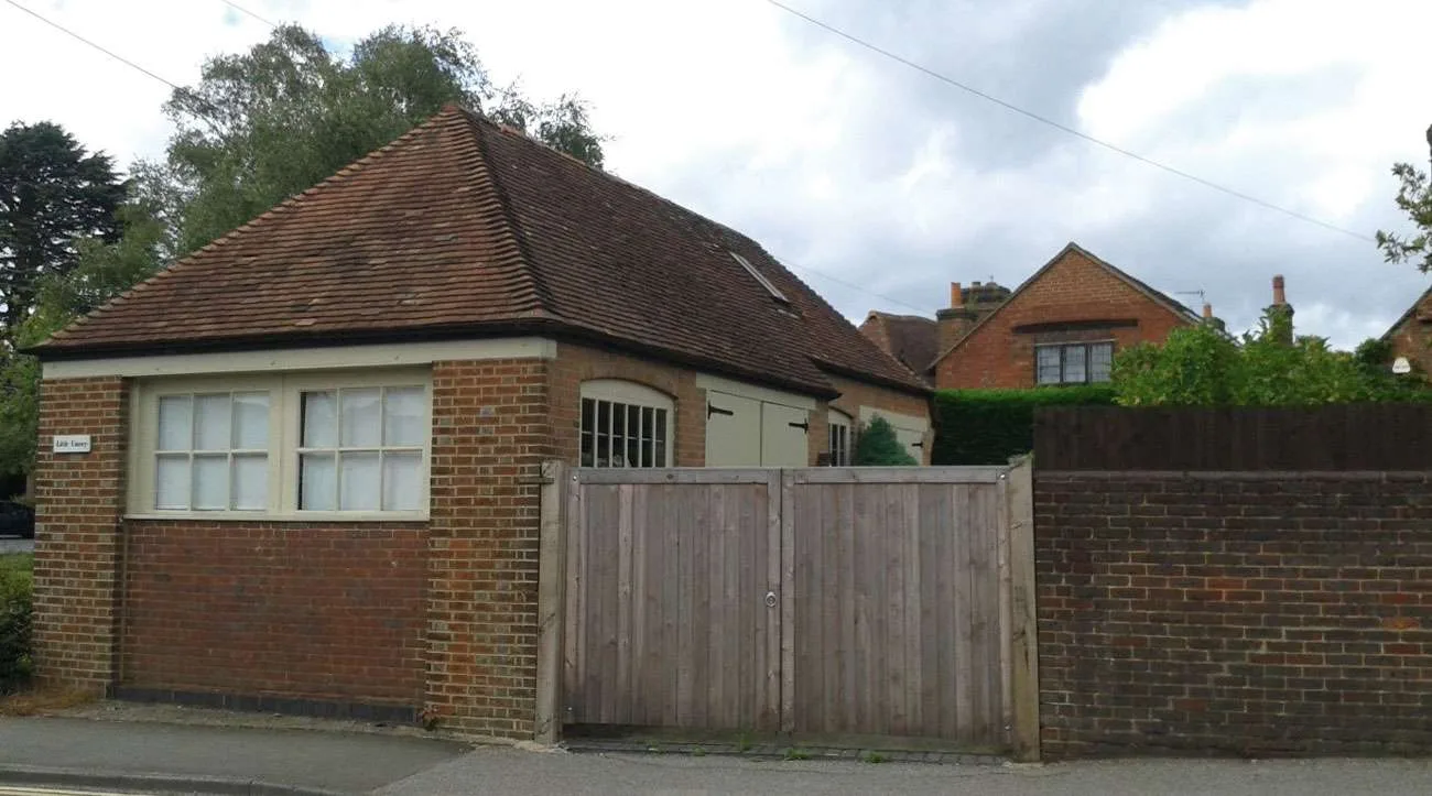 The garage of Little Causey, formerly the wheelwrights forge, in Ewhurst Road