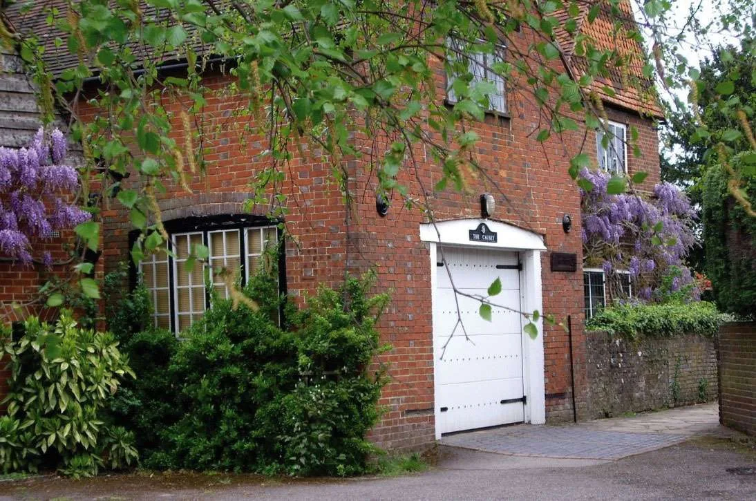 The wheelwrights coach painting house, now the garage of The Causey