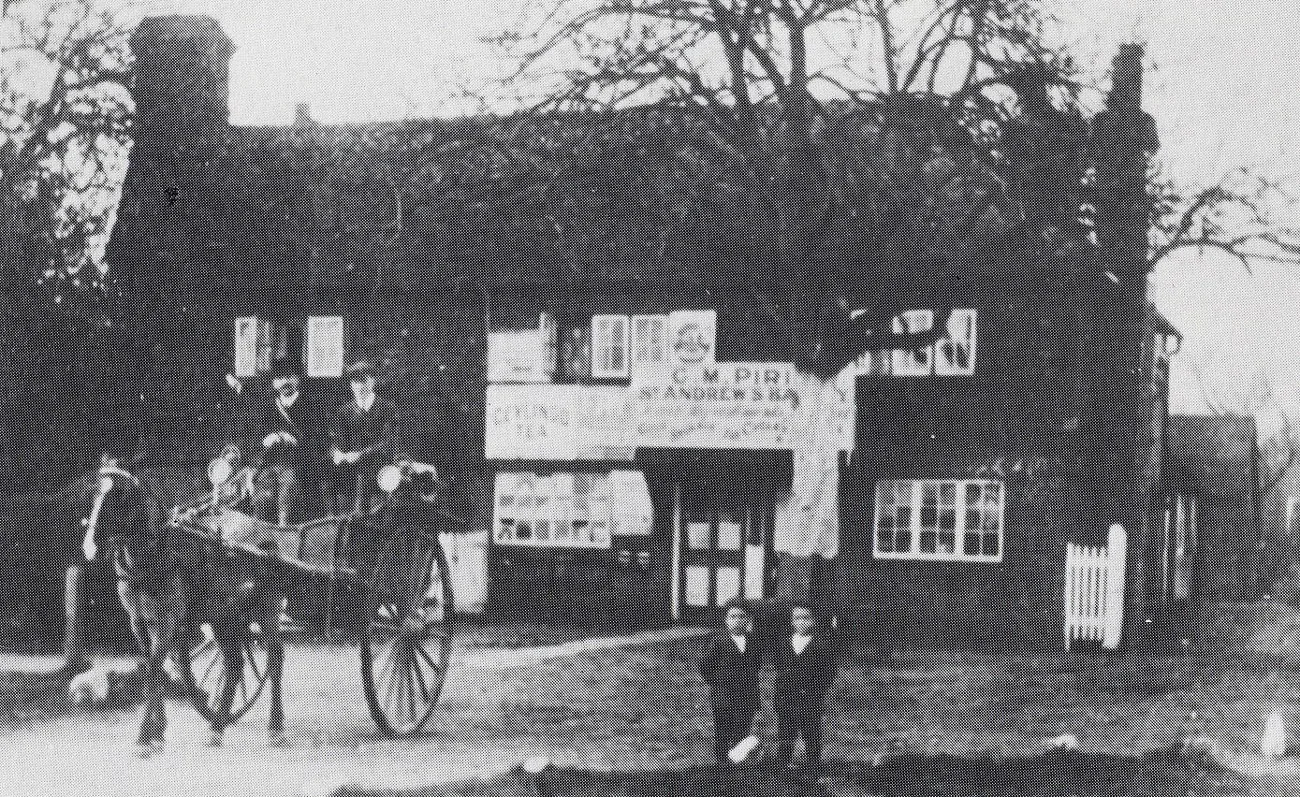 The Pirie twins outside the bakery in about 1915