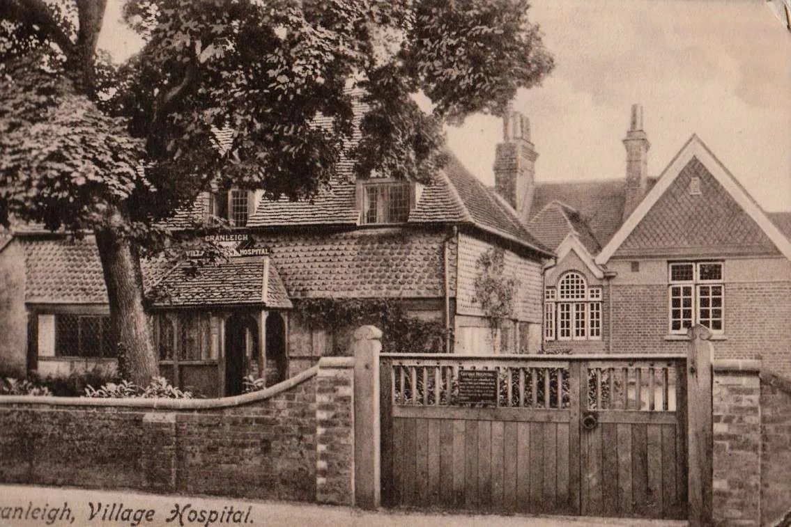 The Village Hospital on a postcard post marked 1913 with the 1901 extension on the right