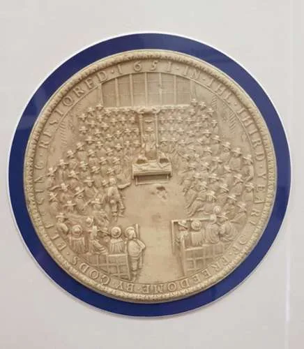 The seal depicts the House of Commons