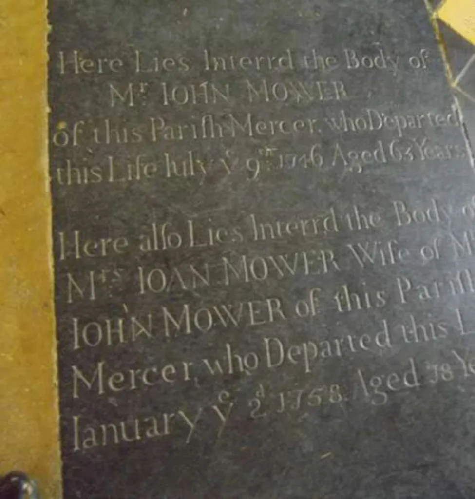 The impressive floor slab in the parish church to John Mower