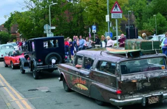 A line of gleaming classic cars on show at the Cranleigh Lions Classic Car Festival