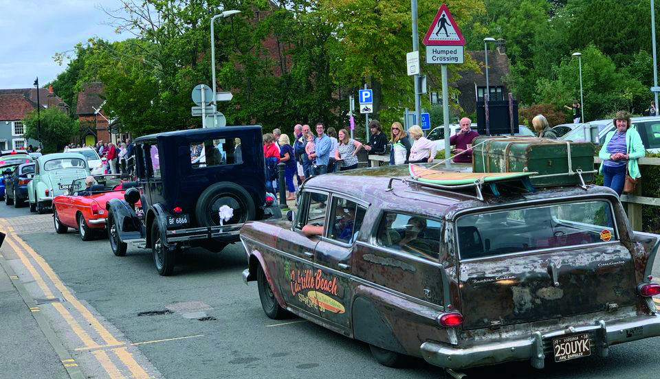 A line of gleaming classic cars on show at the Cranleigh Lions Classic Car Festival