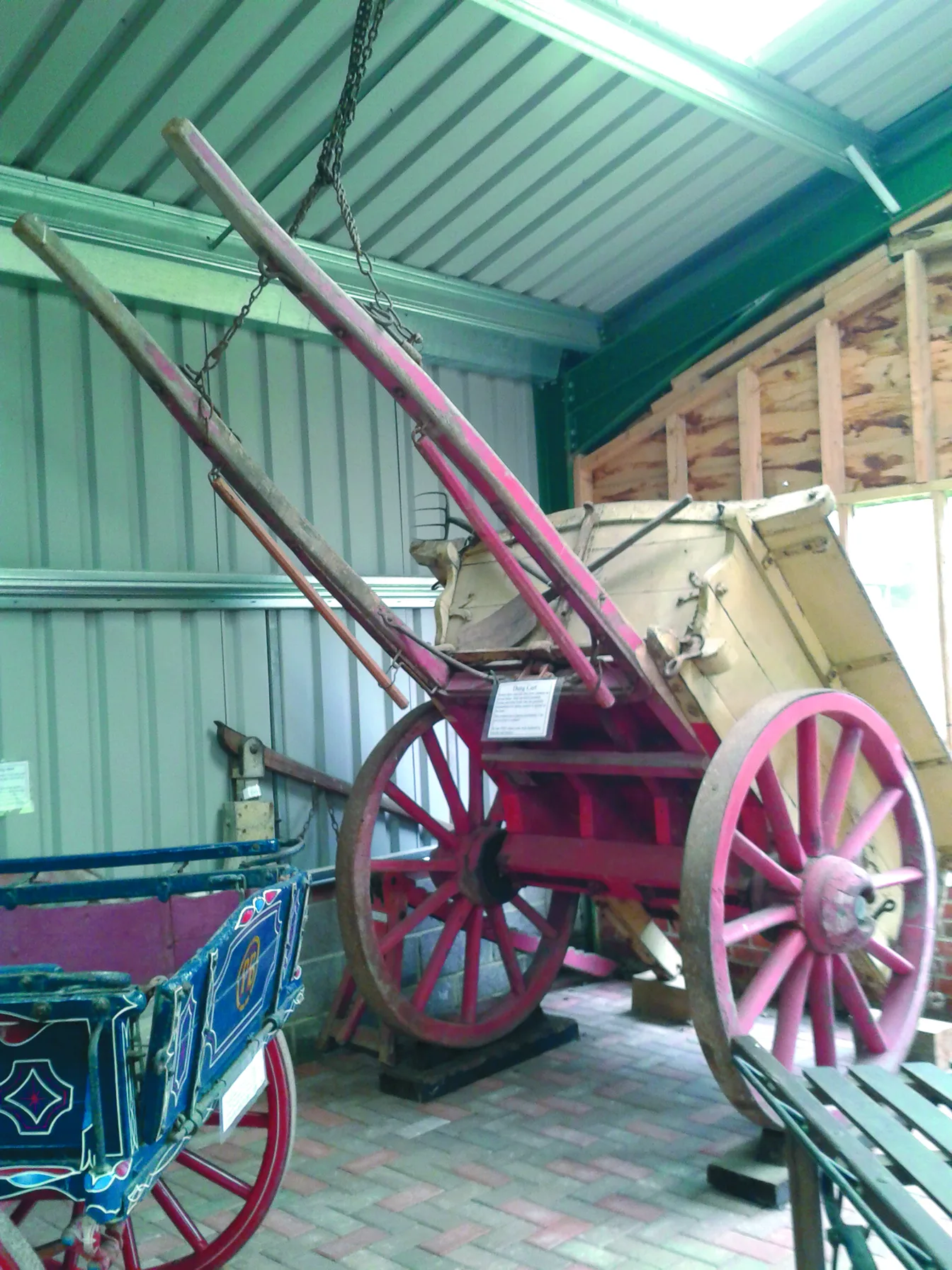 A traditional wooden dung cart on display at the Rural Life Living Museum, Tilford.