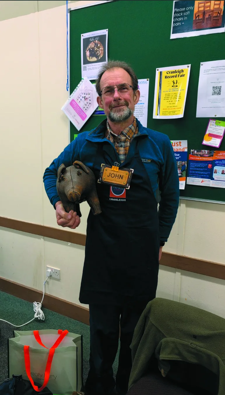 A volunteer working at the Cranleigh Repair Café
