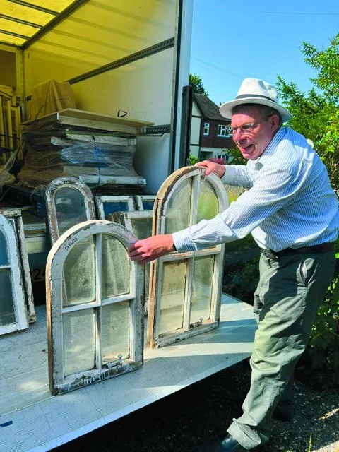 Charles Brooking receiving arched sash windows from a lorry