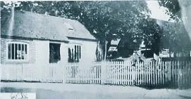 Cheesman's forge with wagons and carts in the yard