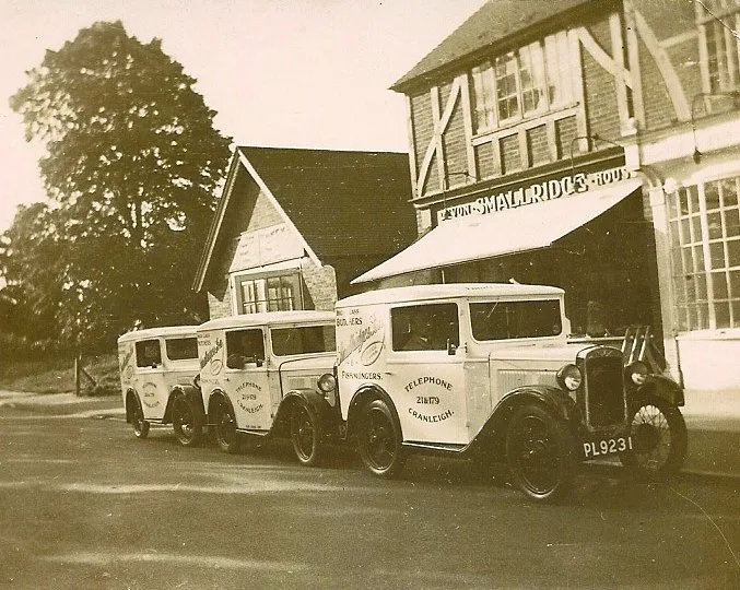 Cheesman's High Street workshop about 1933 with butcher's vans outside