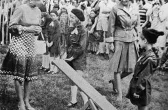 Princess Anne inspecting a line of Brownies at the Cranleigh Show in 1975